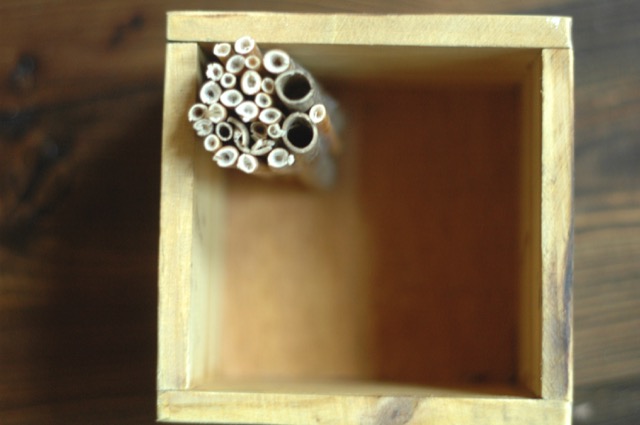 Pack materials tightly into your bee home frame